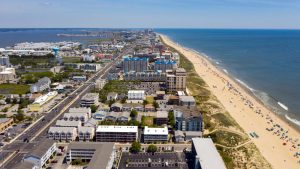 Parasols,dominate,the,aerial,view,of,this,beach,on,the